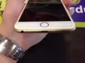 出售一部蘋果金色6plus128G,剛過保修期