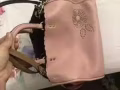 一個Coach粉色女包轉賣