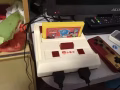 小霸王經典普通紅白遊戲機，送兩個遊戲卡，兩個牛角手柄是