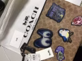 Coach 名牌手拿包