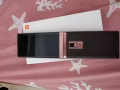 9.5成新金立翻蓋老闆手機。w909僅售200新幣！